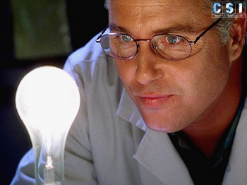 Grissom gazes into a lightbulb