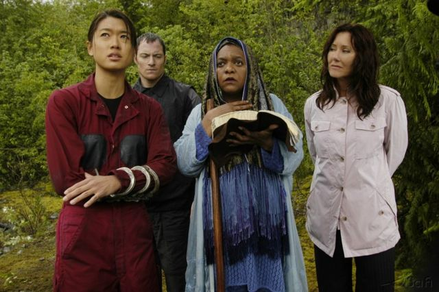 Sharon, Helo, Priestess Elosha, and President Roslin read scripture on Kobol