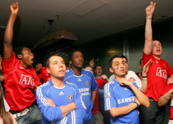 Manchester United and Chelsea fans watching a televised game at Nevada Smith’s pub in New York City