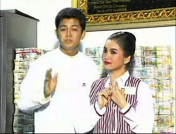 Myanmar Oriental Bank (MOB) – this ad features the two actors Lwin Moe and Nan Dar Hline promoting the bank’s new ATM facilities (in 2003) whilst standing in front of a huge stack of cash