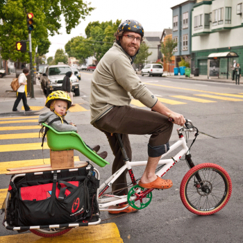 San Francisco father and child commuting by bicycle