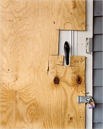 Boarded door of a foreclosed house