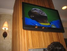 Television on the wall of a bar during the World Cup 2010