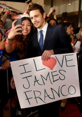 James Franco Stands With a Fan