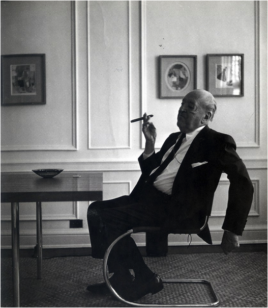 Architect Mies van der Rohe smoking a cigar