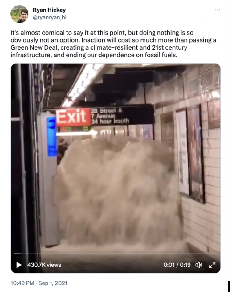 A screenshot of a tweet with a paused video of water rushing onto a subway platform